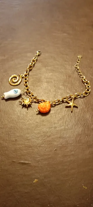 Pulsera Acero Dorado Pez Blanco y Estrella