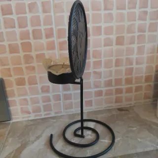 Portacandele nero a forma di sole