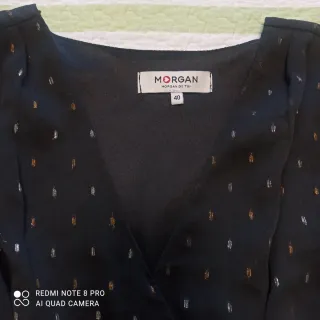 Blusa Morgan gasa negra con detalles dorados