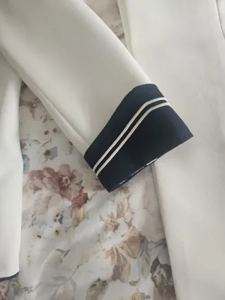 Traje de Comunión vainilla y Azul Talla 10.