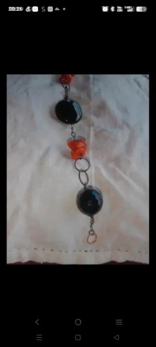 Braccialetto corallo e pietre dure nere