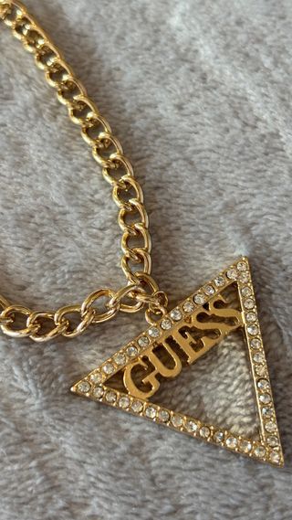 Pulsera Guess Triángulo Dorado con diemantes