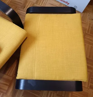 Sillón y reposapiés IKEA POÄNG negro/amarillo