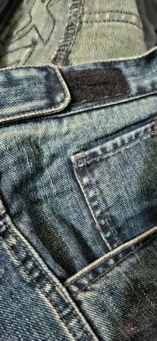 Pantalón de moto azul y negro