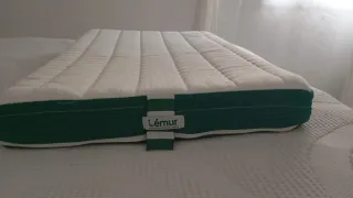 Minicuna colecho gris con peluches