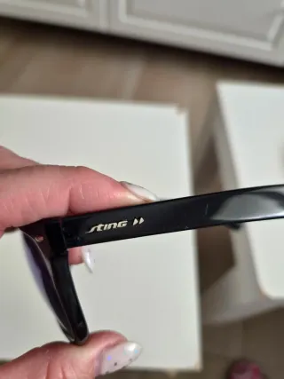 Gafas de sol Sting negras con lentes verdes