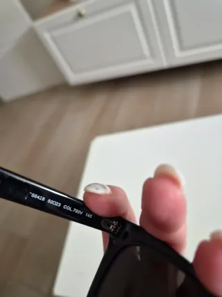 Gafas de sol Sting negras con lentes verdes