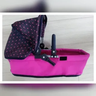 Carrito de bebé rosa y azul