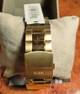 Reloj GUESS octogonal, dorado y negro