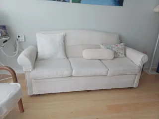 Sofá blanco crudo con funda de tela