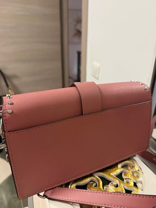 Bolso Michael Kors tachuelas rosa