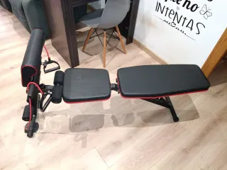 Banco de pesas ajustable con accesorios