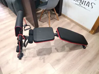 Banco de pesas ajustable con accesorios