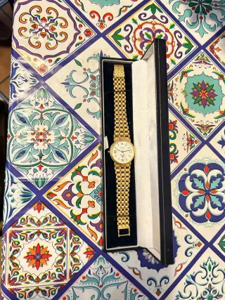 Reloj Cyma de 18 Kilates