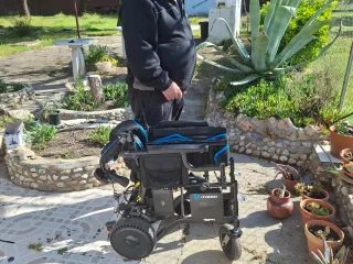Silla de ruedas electrica,mando para acompañante.