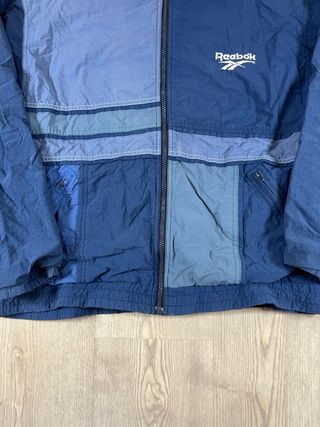 Chaqueta Reebok azul y gris