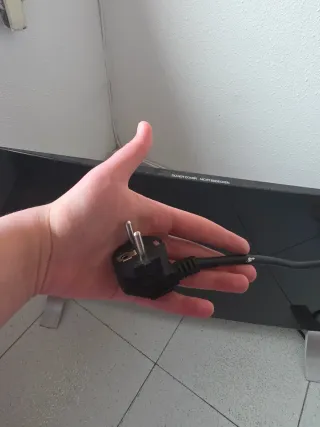 Radiador de cristal negro con su mando