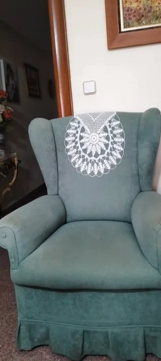 Sillón orejero verde