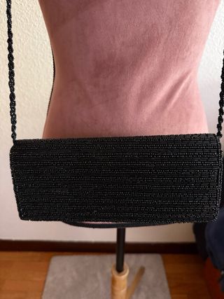 Bolso de fiesta negro y dorado