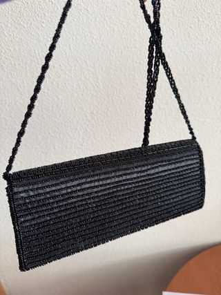 Bolso de fiesta negro y dorado