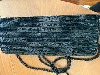 Bolso de fiesta negro y dorado