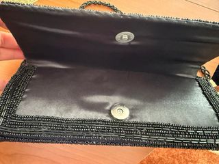 Bolso de fiesta negro y dorado