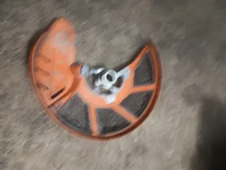 Protector disco KTM naranja