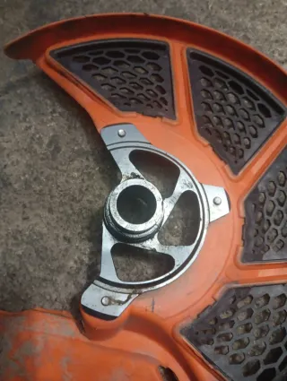 Protector disco KTM naranja