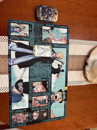 Lata, tapete y carta promo sellada de Sabo.