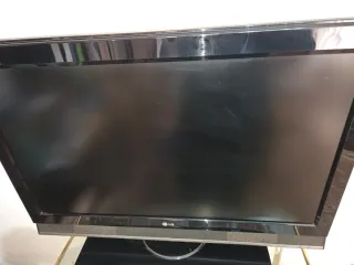 Mesa auxiliar cristal y metal dorado, televisión