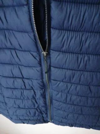 Plumífero azul mujer