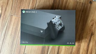 Xbox One X 1TB completa