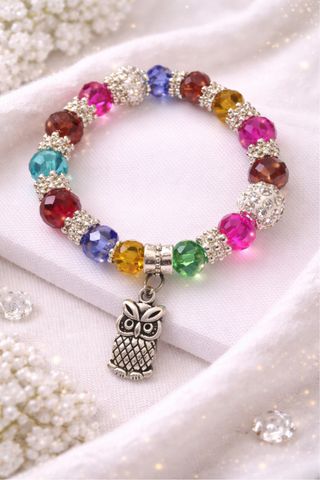 Pulsera multicolor con charm de búho