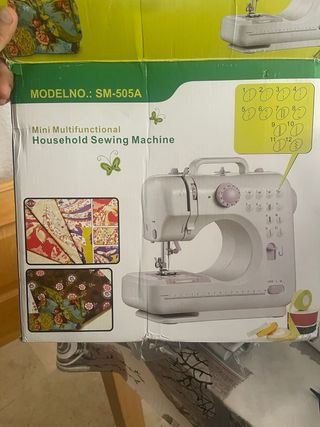 Máquina de coser con 12 puntadas