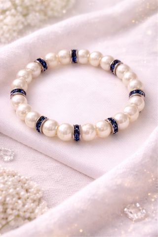 Pulsera perlas y detalles azules