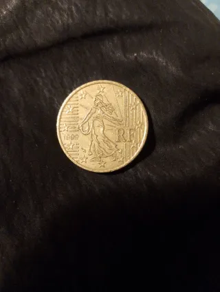 Moneda 50 cent mujer sembrando