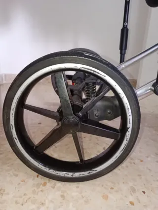 Carrito de bebé rosa