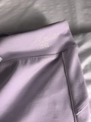 Leggings malva con detalle lateral