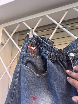 Pantalones vaqueros marca EL NIÑO con llamas