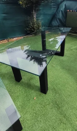 Mesas de forja y cristal como nuevas