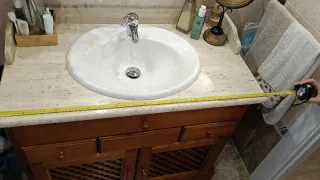 Mueble baño madera y piedra