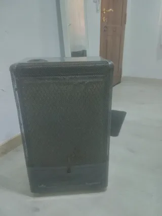 Estufa de butano con manguera naranja