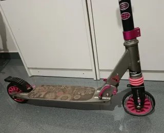 Patinete Oxelo rosa y gris