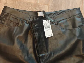 Pantalón efecto cuero recto talla plus MANGO