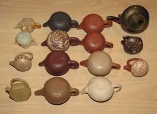 Conjunto di teiere orientali in miniatura Yixing dalla Cina