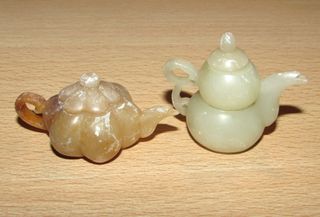 Conjunto di teiere orientali in miniatura Yixing dalla Cina