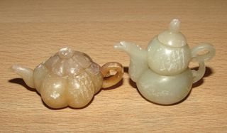 Conjunto di teiere orientali in miniatura Yixing dalla Cina