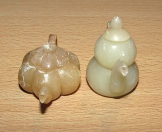 Conjunto di teiere orientali in miniatura Yixing dalla Cina