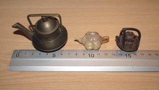 Conjunto di teiere orientali in miniatura Yixing dalla Cina