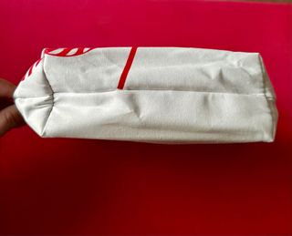 Pochette Clarins con stampa lecca-lecca